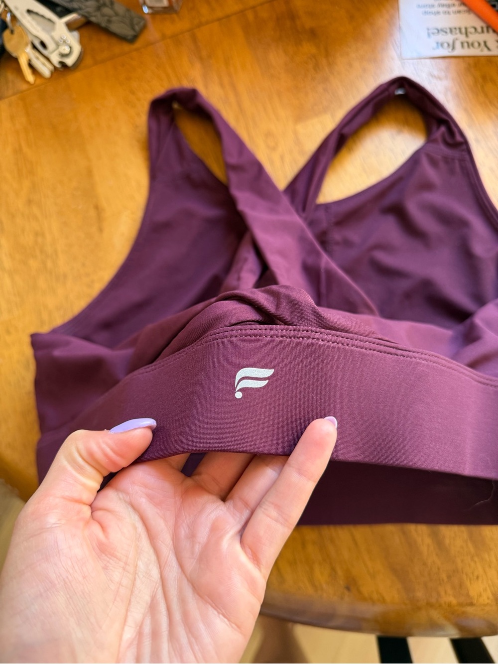 Fabletics Women’s Cross-Back Sports Bra in Plum large
